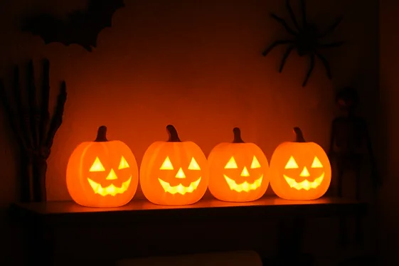 Place Miniature Jack-O’-Lanterns on Shelves illustration